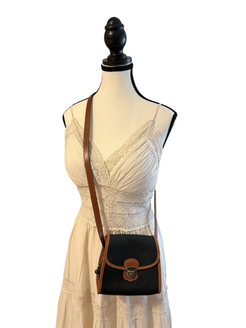 Authentic  Dooney and Bourke Crossbody Bag with Brown Trim and Adjustable Strap - Picture 2 of 12